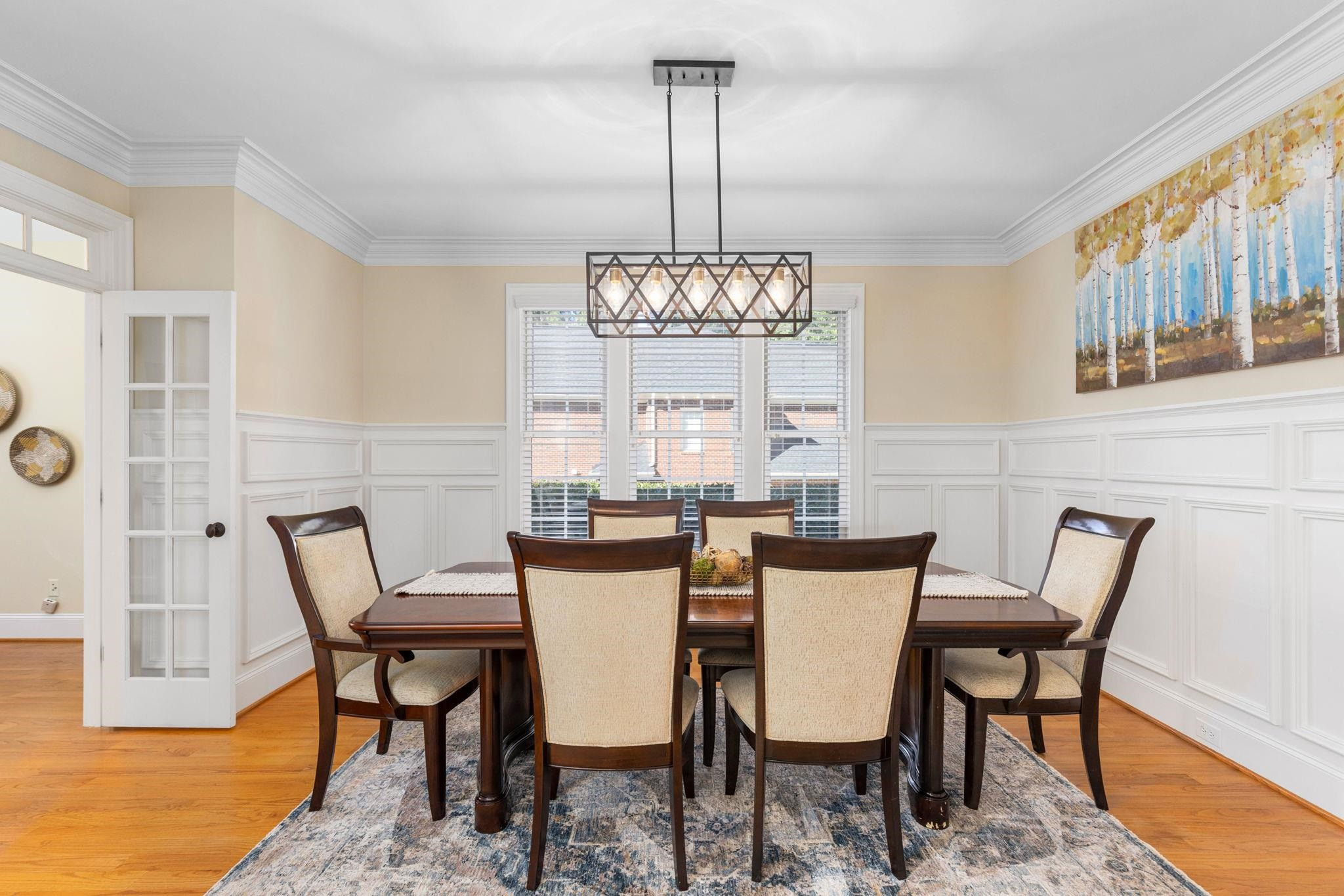3720 Grandbridge Drive Apex, NC 27539 - Photo 13 of 81 a view of a dining room with furniture window and wooden floor
