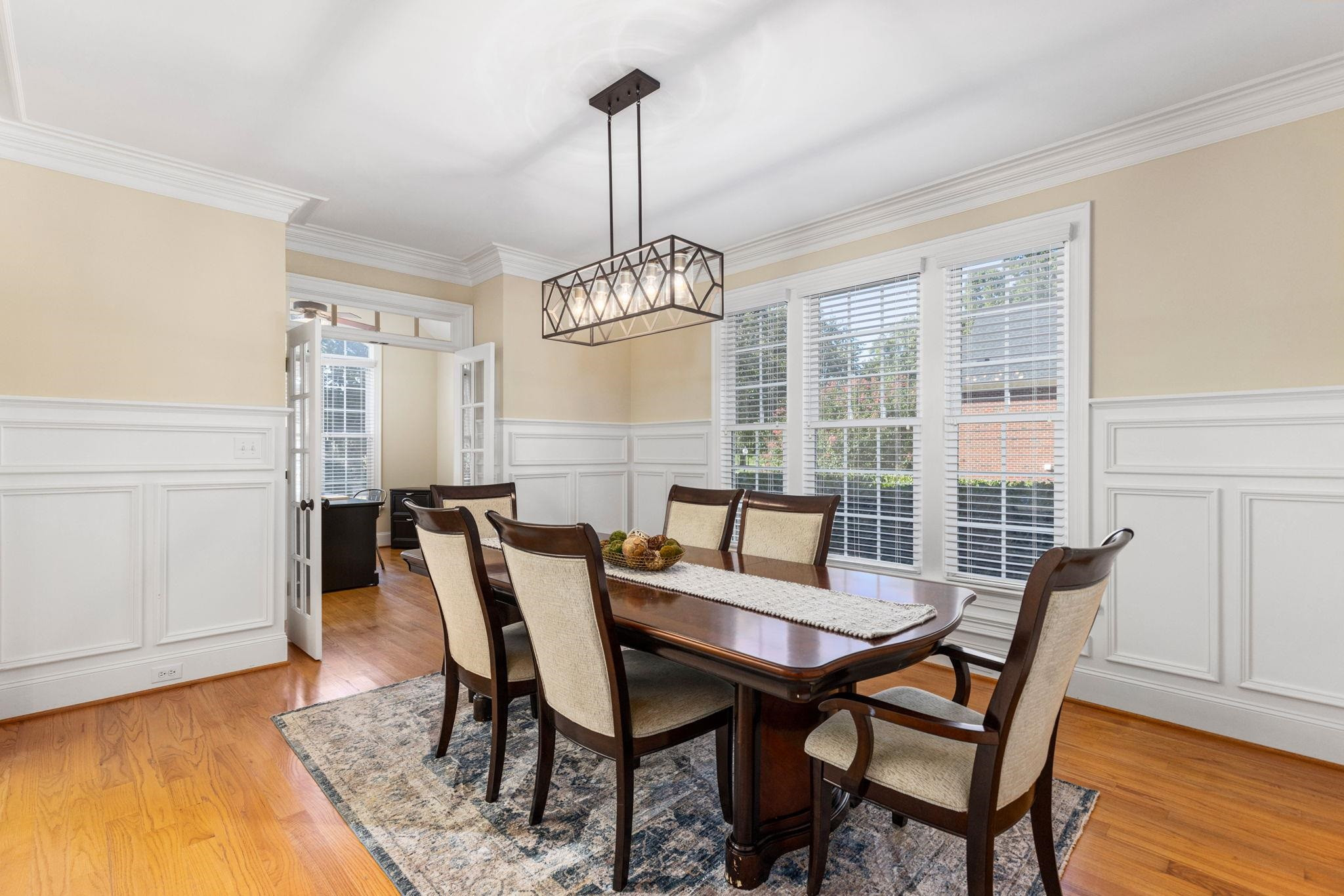 3720 Grandbridge Drive Apex, NC 27539 - Photo 14 of 81 a view of a dining room with furniture window and wooden floor