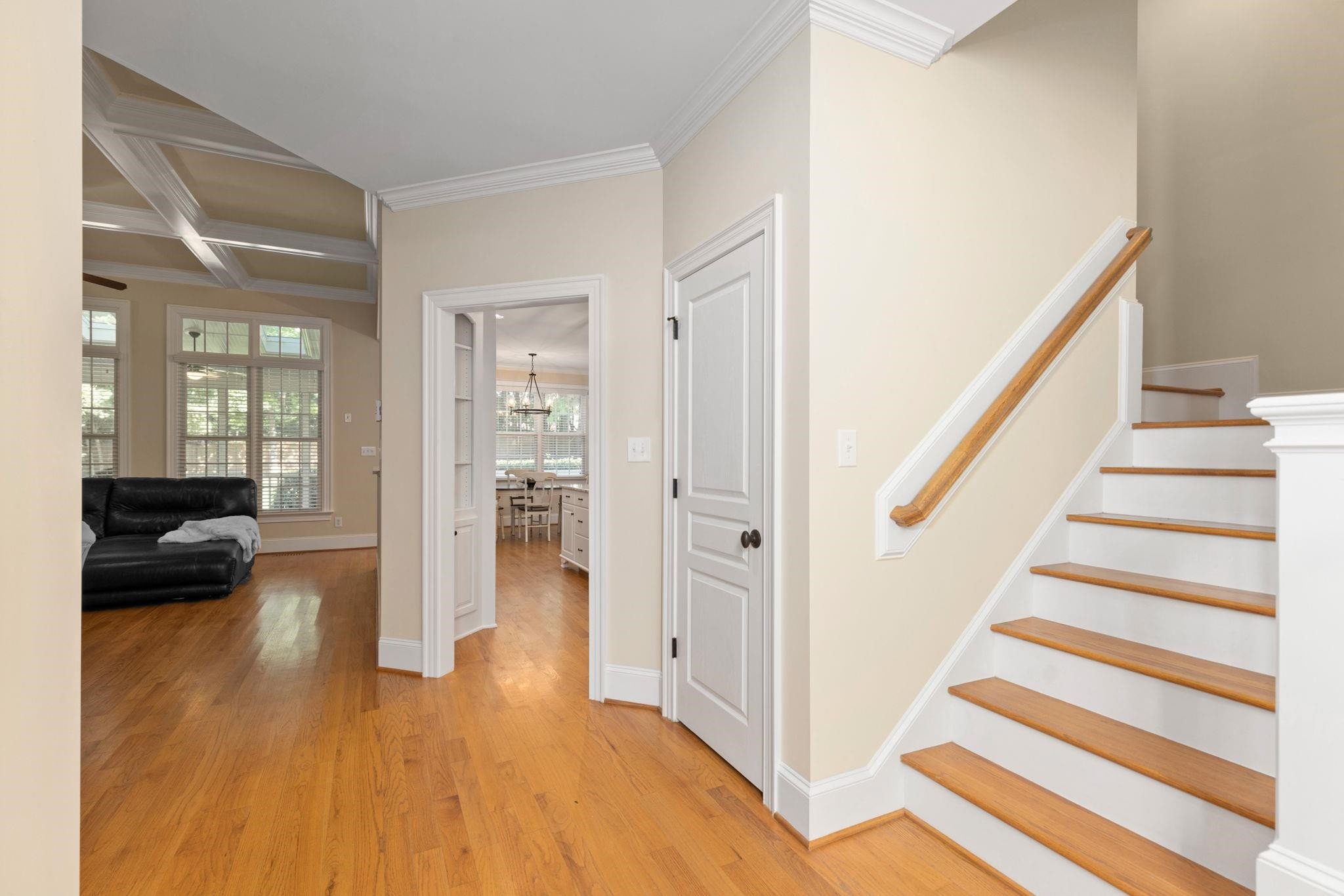 3720 Grandbridge Drive Apex, NC 27539 - Photo 16 of 81 a view of a hallway view with wooden floor and staircase