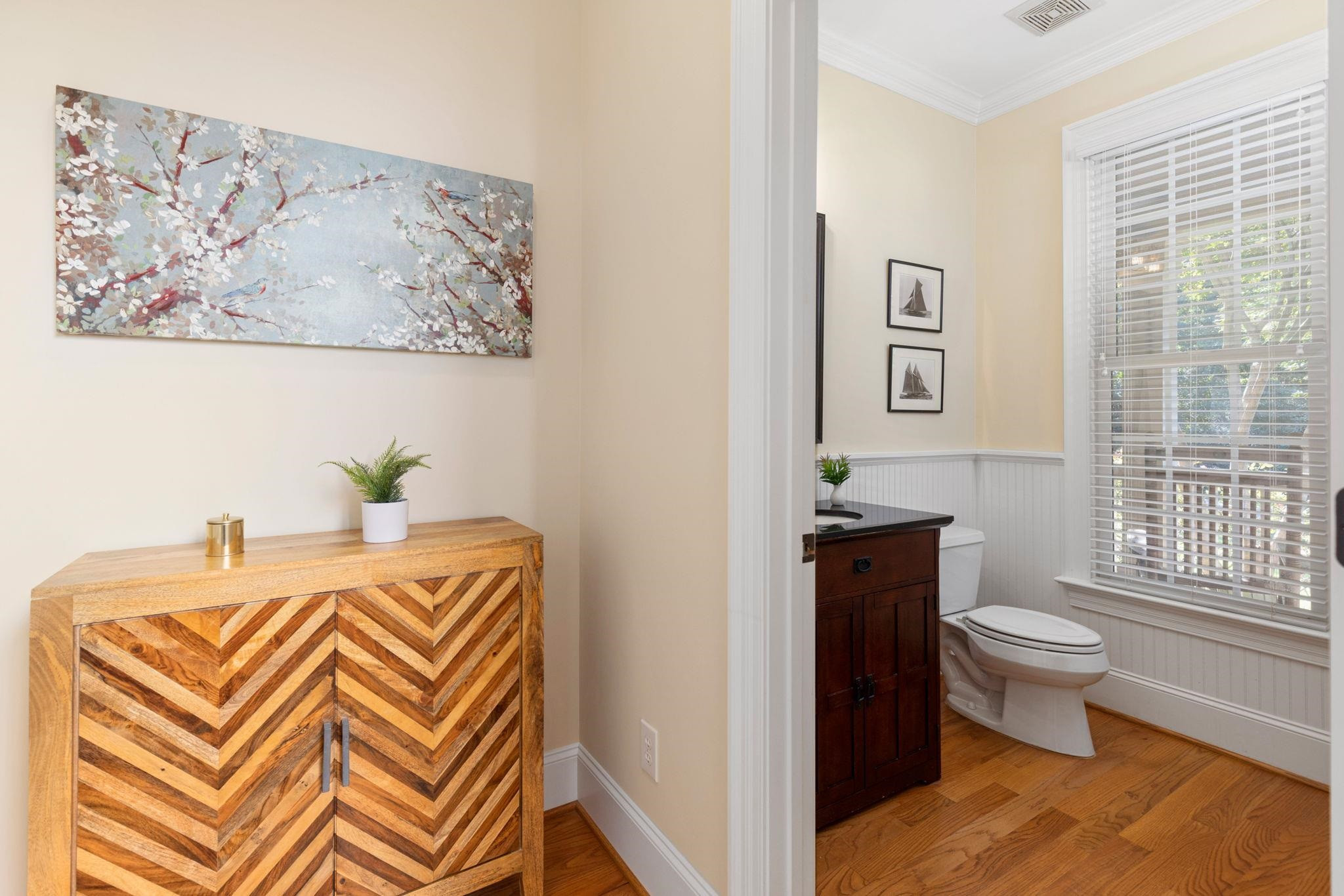 3720 Grandbridge Drive Apex, NC 27539 - Photo 17 of 81 a view of a bedroom with a bed and wooden floor