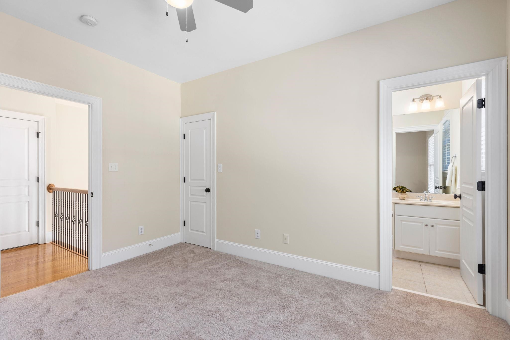3720 Grandbridge Drive Apex, NC 27539 - Photo 37 of 81 an empty room with cabinet and mirrors