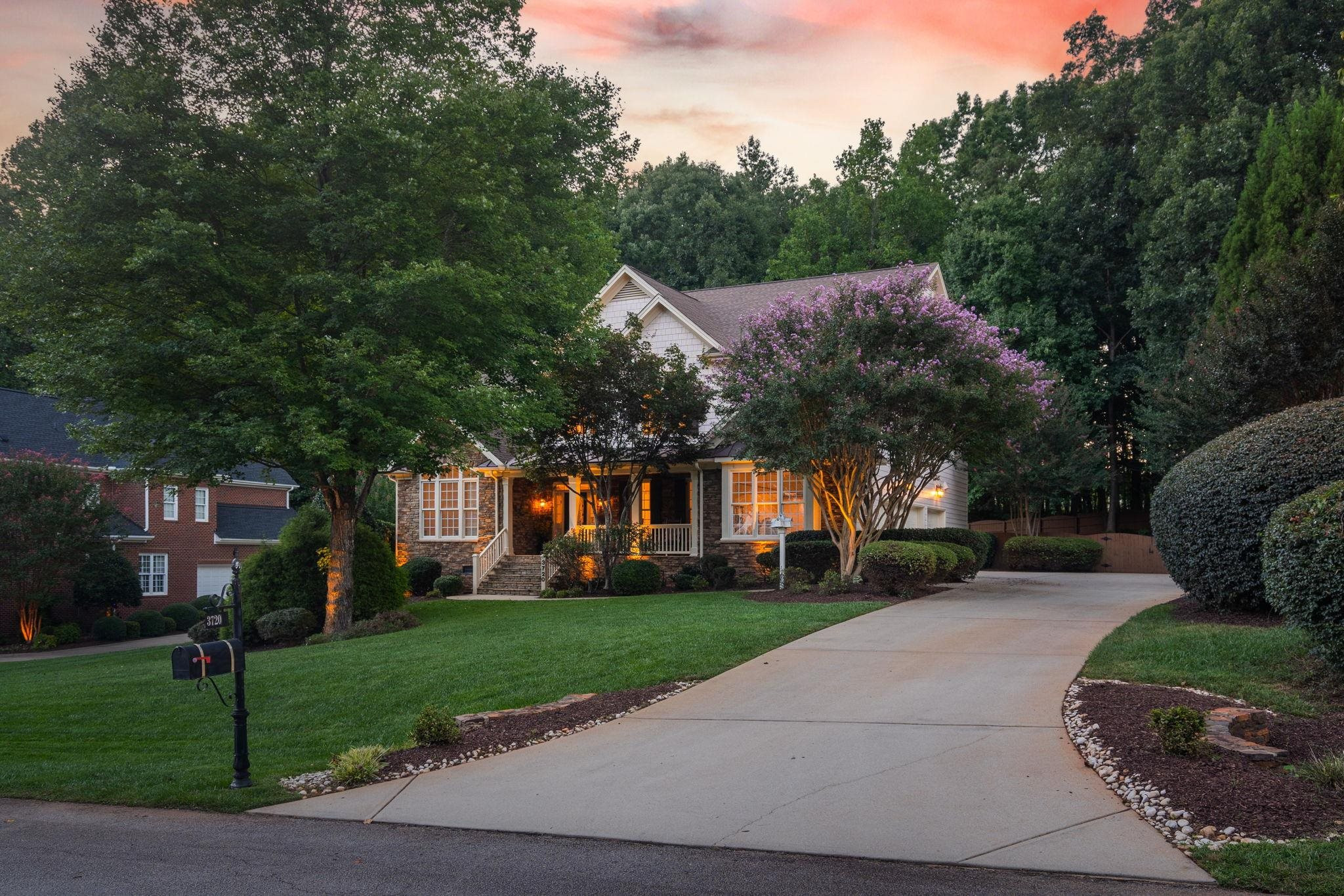 3720 Grandbridge Drive Apex, NC 27539 - Photo 4 of 81 a front view of house with yard and green space