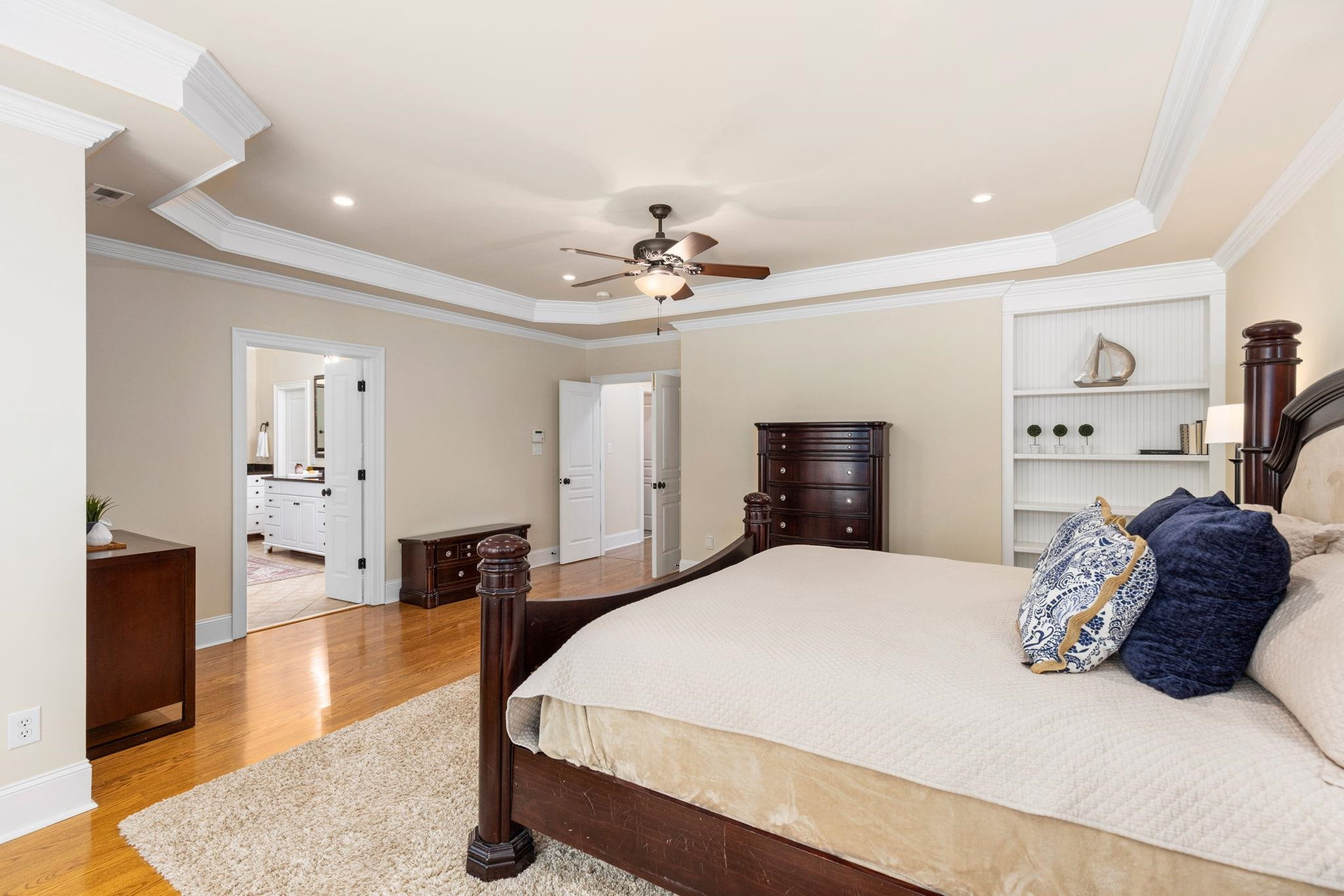 3720 Grandbridge Drive Apex, NC 27539 - Photo 44 of 81 a spacious bedroom with a bed and dresser