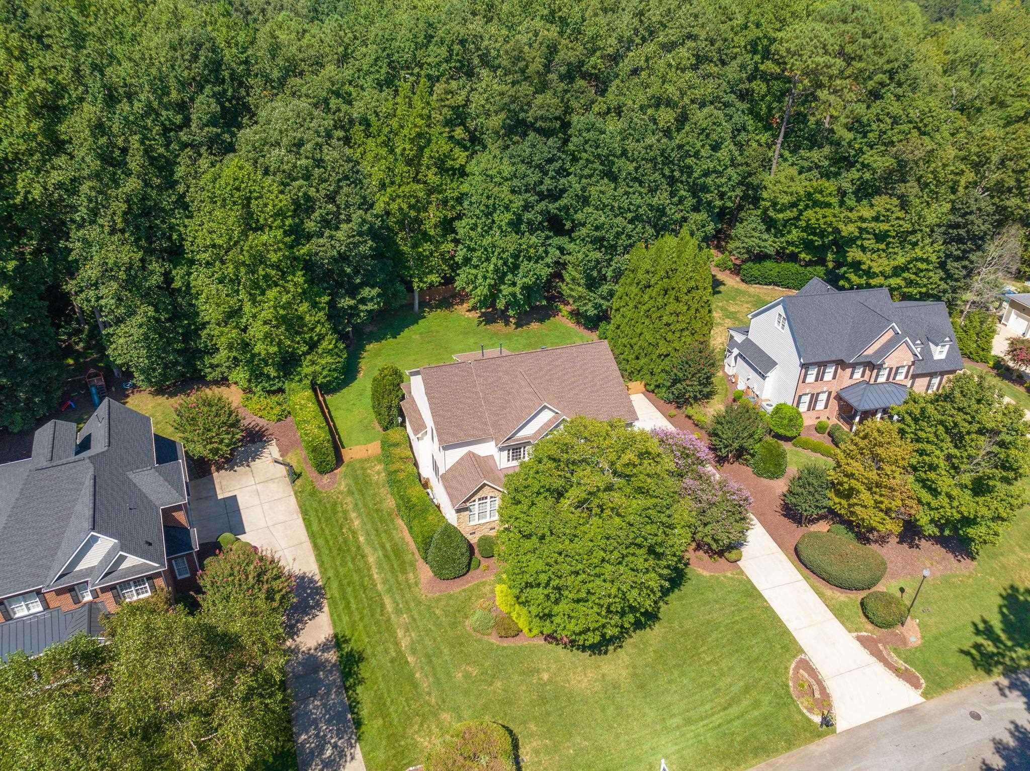 3720 Grandbridge Drive Apex, NC 27539 - Photo 75 of 81 an aerial view of a house with a yard and trees