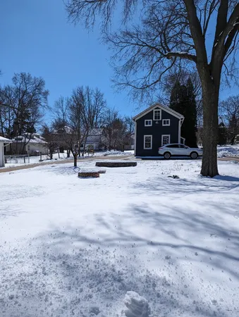 a front view of a house with yard