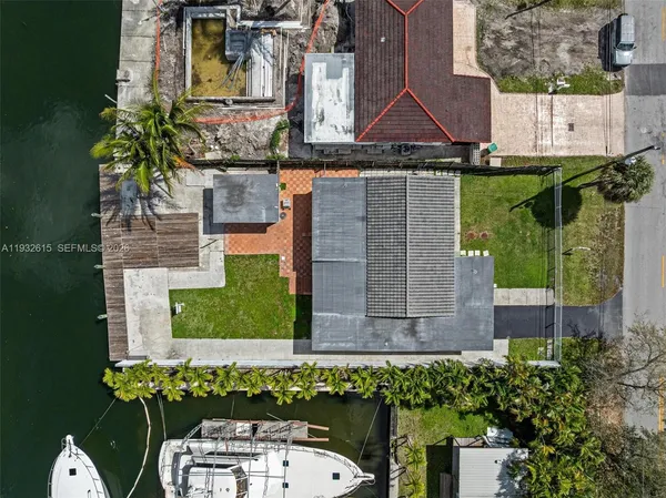 an aerial view of a house with a garden