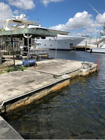 a view of a swimming pool with outdoor seating