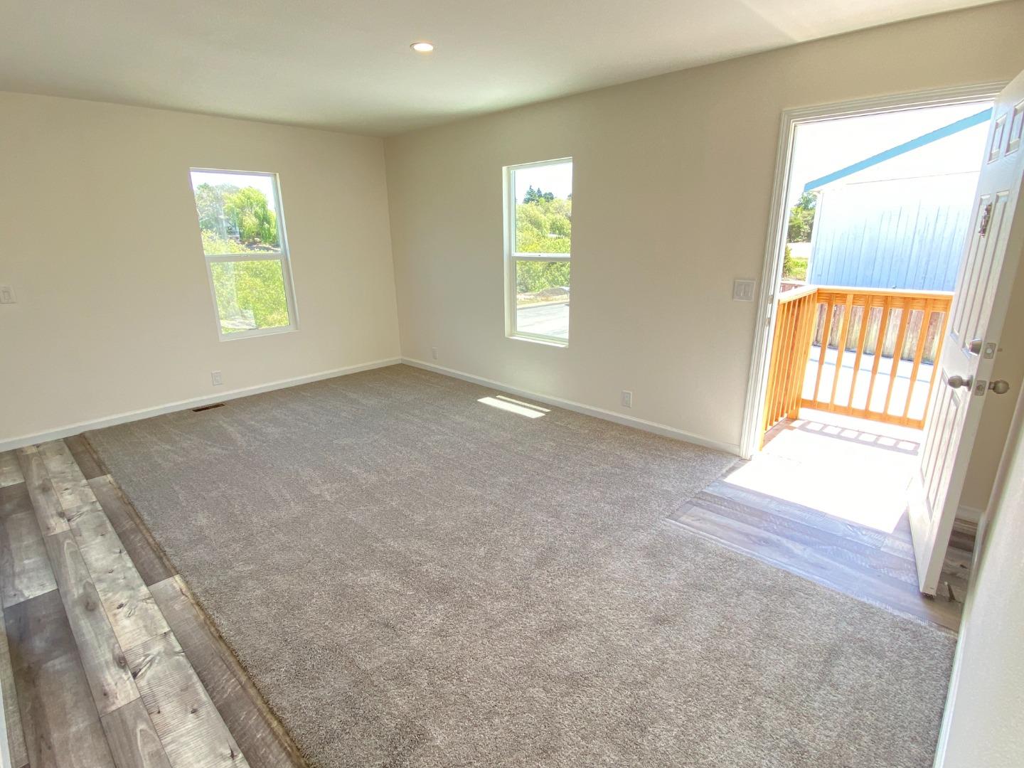 128 Pera Drive, Unit 128 Watsonville, CA 95076 - Photo 18 of 29 an empty room with windows