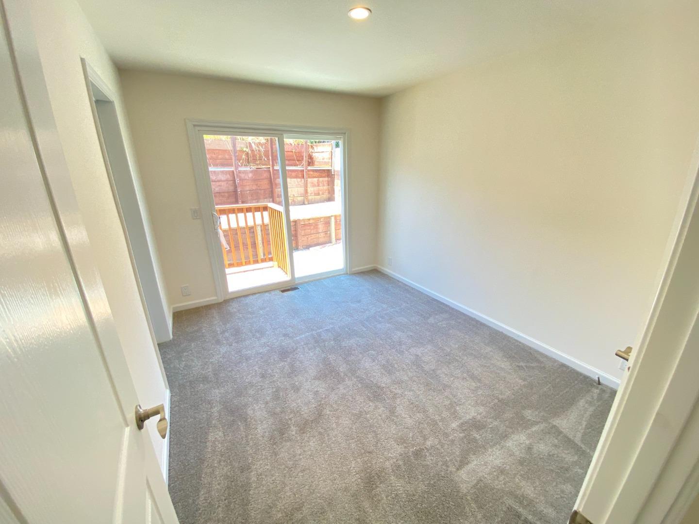 128 Pera Drive, Unit 128 Watsonville, CA 95076 - Photo 23 of 29 an empty room with windows