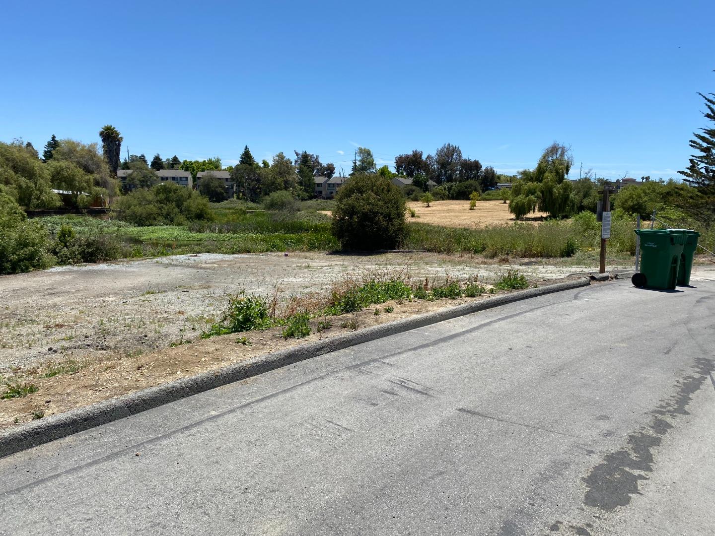 128 Pera Drive, Unit 128 Watsonville, CA 95076 - Photo 28 of 29 a view of a road with a building in the background