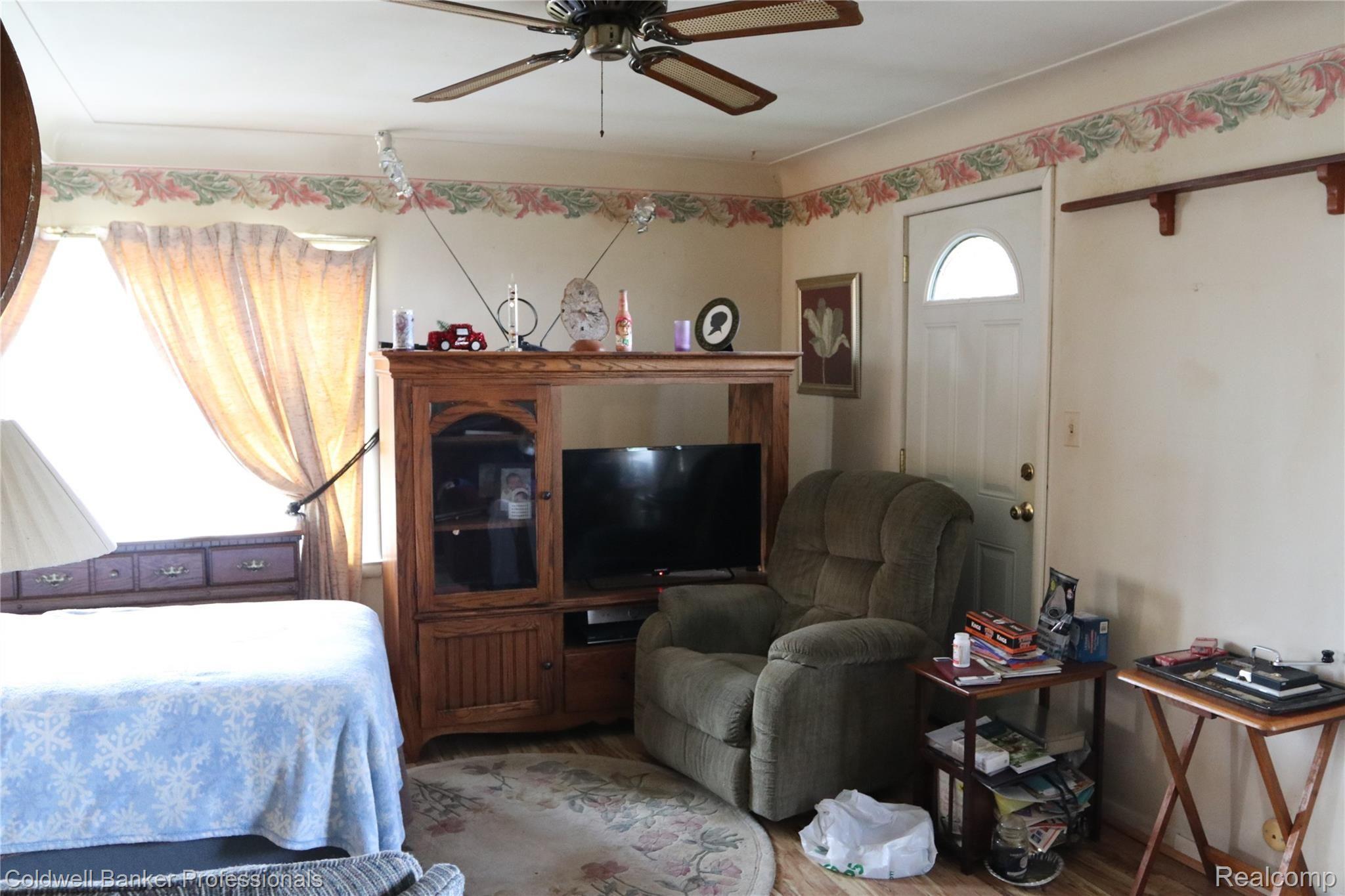5805 South Corey Road Perry, MI 48872 - Photo 10 of 19 10 5805 Living Room.JPG