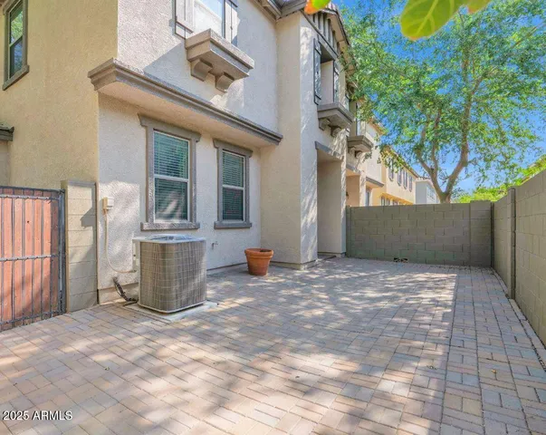 a view of a back yard of the house