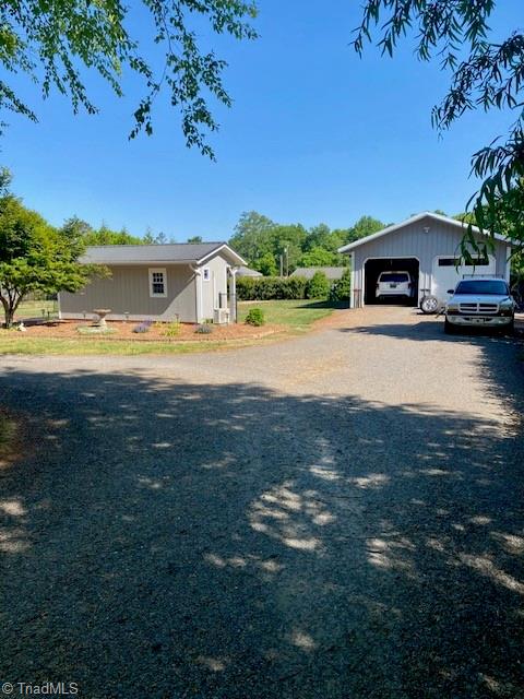 131 Parsonage Drive Advance, NC 27006 - Photo 21 of 41 Garage and Outdoor Room