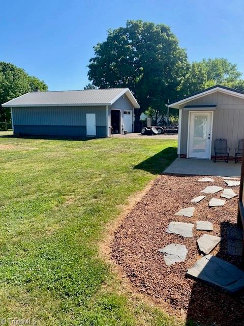131 Parsonage Drive Advance, NC 27006 - Photo 23 of 41 Outdoor Room and Garage