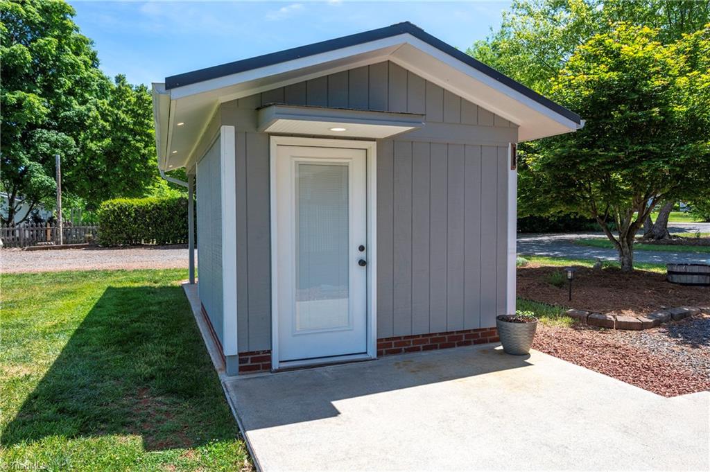 131 Parsonage Drive Advance, NC 27006 - Photo 26 of 41 Heated and cooled outdoor hobby room