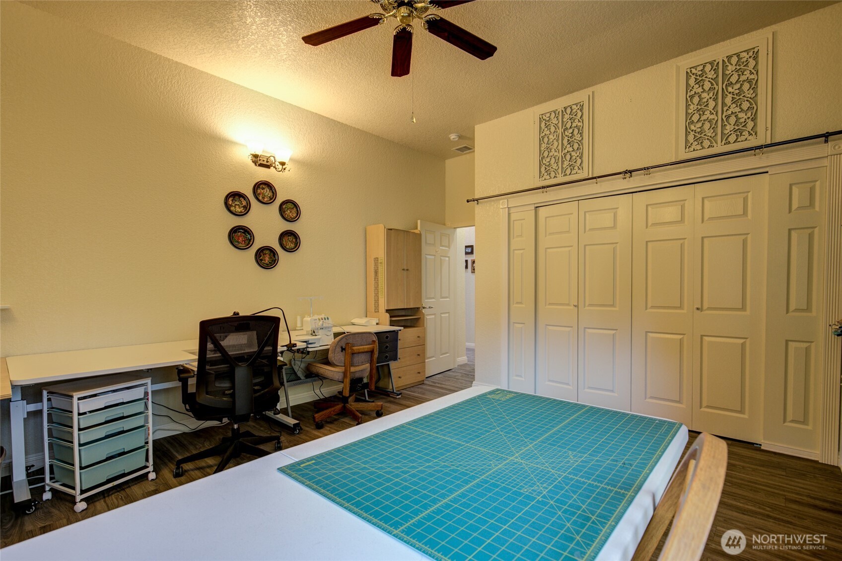 2695 State Route 109 Copalis Beach, WA 98535 - Photo 16 of 40 a view of a workspace with furniture and a ceiling fan