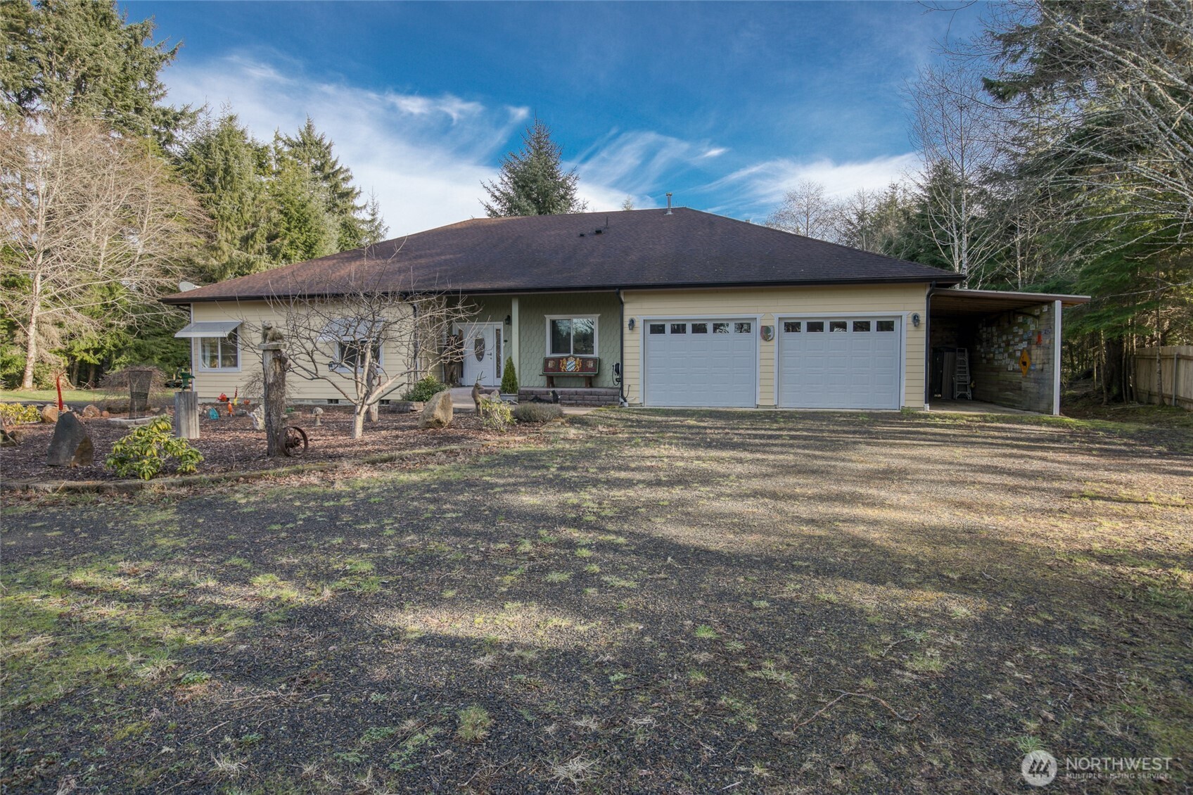 2695 State Route 109 Copalis Beach, WA 98535 - Photo 2 of 40 a front view of a house with garden