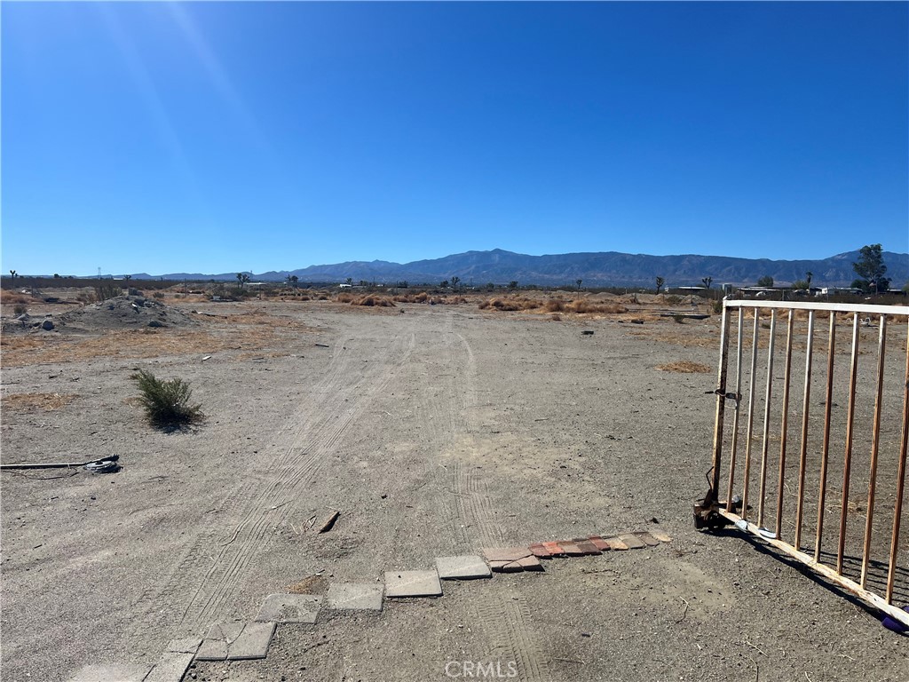 3836 Holly Road Phelan, CA 92371 - Photo 3 of 4 a view of a lake view and mountain view
