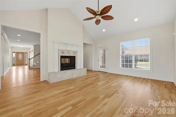 a large kitchen with stainless steel appliances lots of counter space and a sink