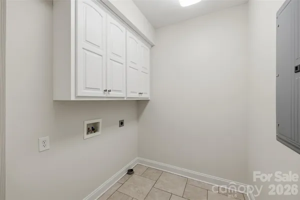 a bathroom with a white bath tub and shower