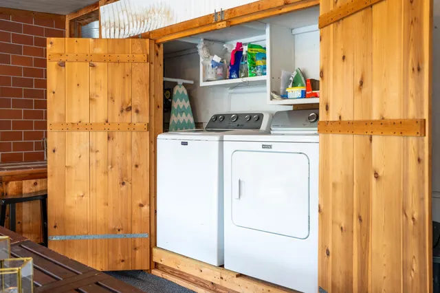 a kitchen with a refrigerator and countertop