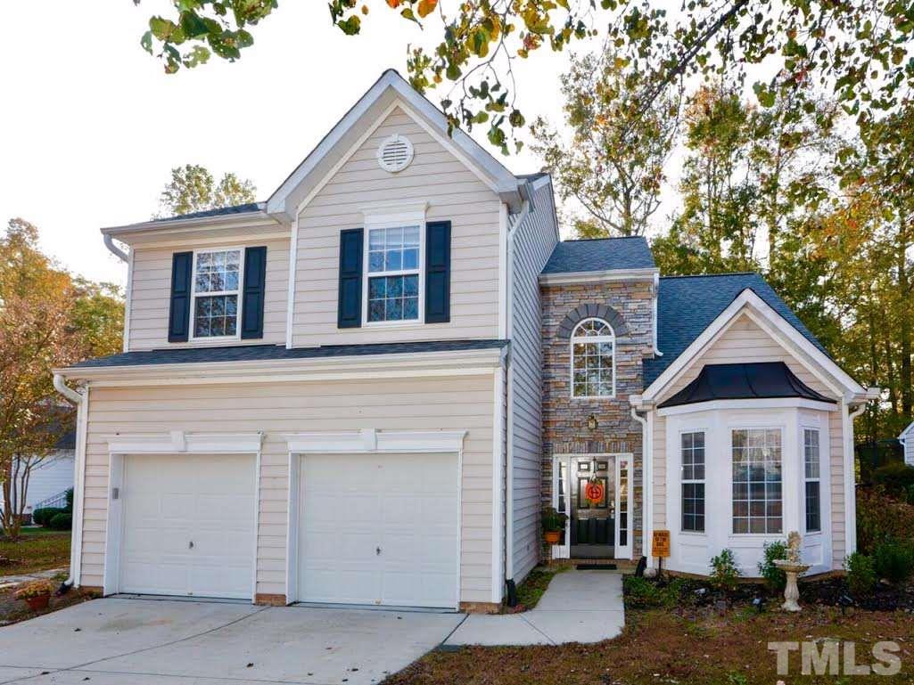 4604 Drewbridge Way Raleigh, NC 27604 - Photo 1 of 24 front view of a house with a yard