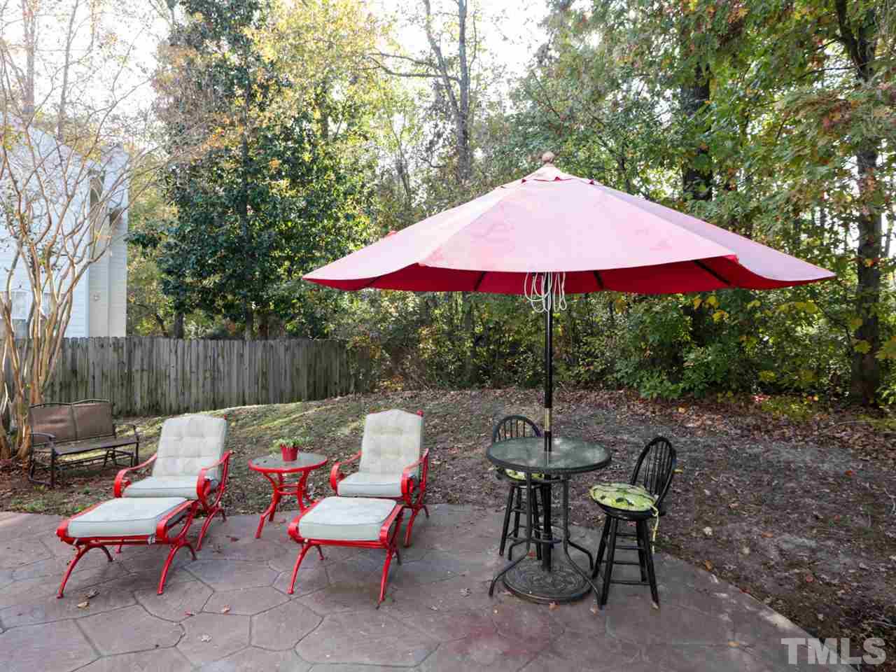 4604 Drewbridge Way Raleigh, NC 27604 - Photo 21 of 24 an outdoor sitting area with furniture and wooden deck