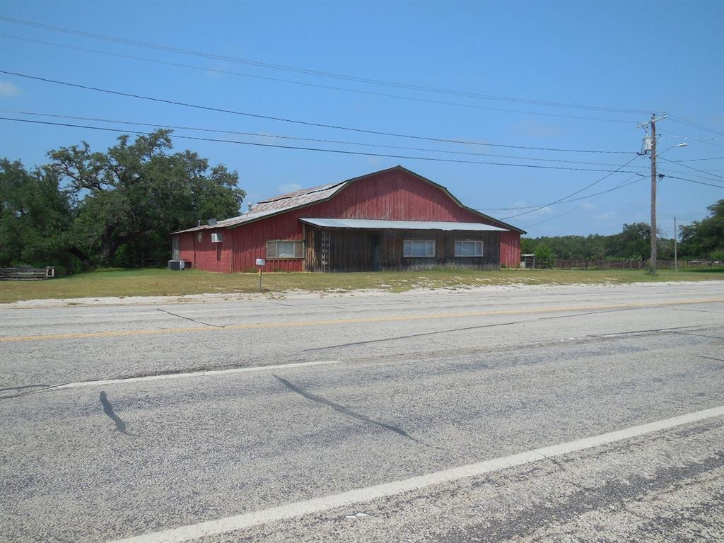 605 East Loop 254 Ranger, TX 76470 - Photo 1 of 21 a front view of a house with a yard