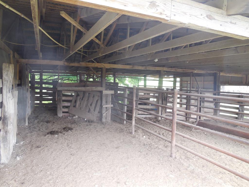 605 East Loop 254 Ranger, TX 76470 - Photo 12 of 21 a view of empty room with wooden ceiling