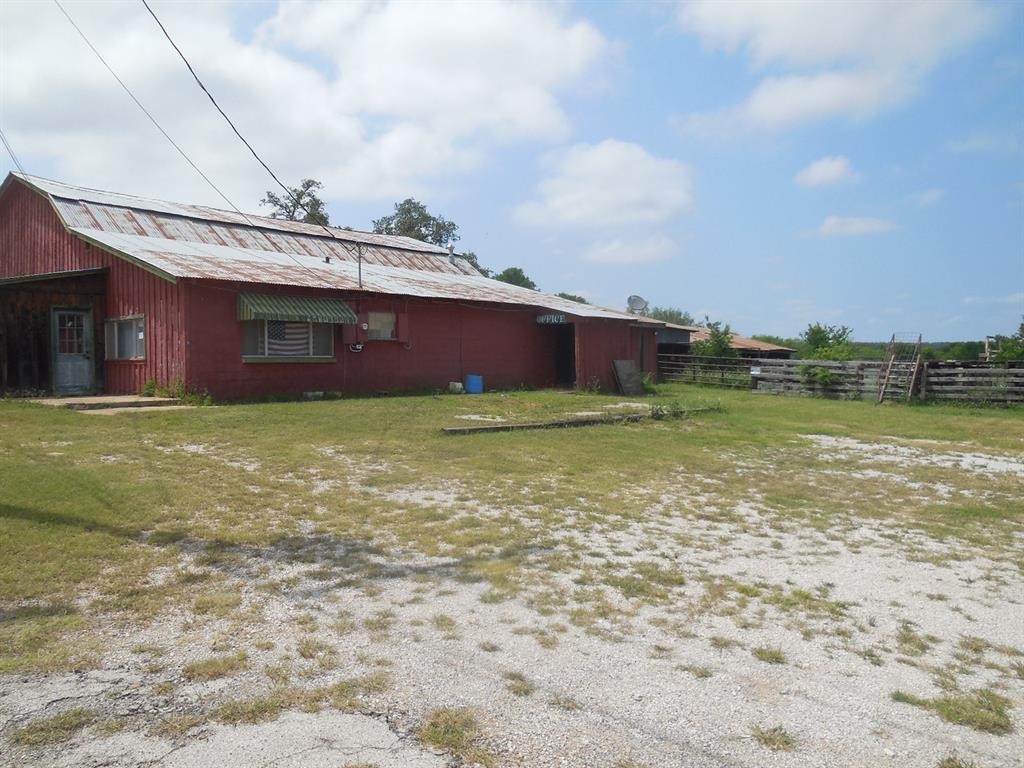 605 East Loop 254 Ranger, TX 76470 - Photo 19 of 21 a view of a large pool with a big yard