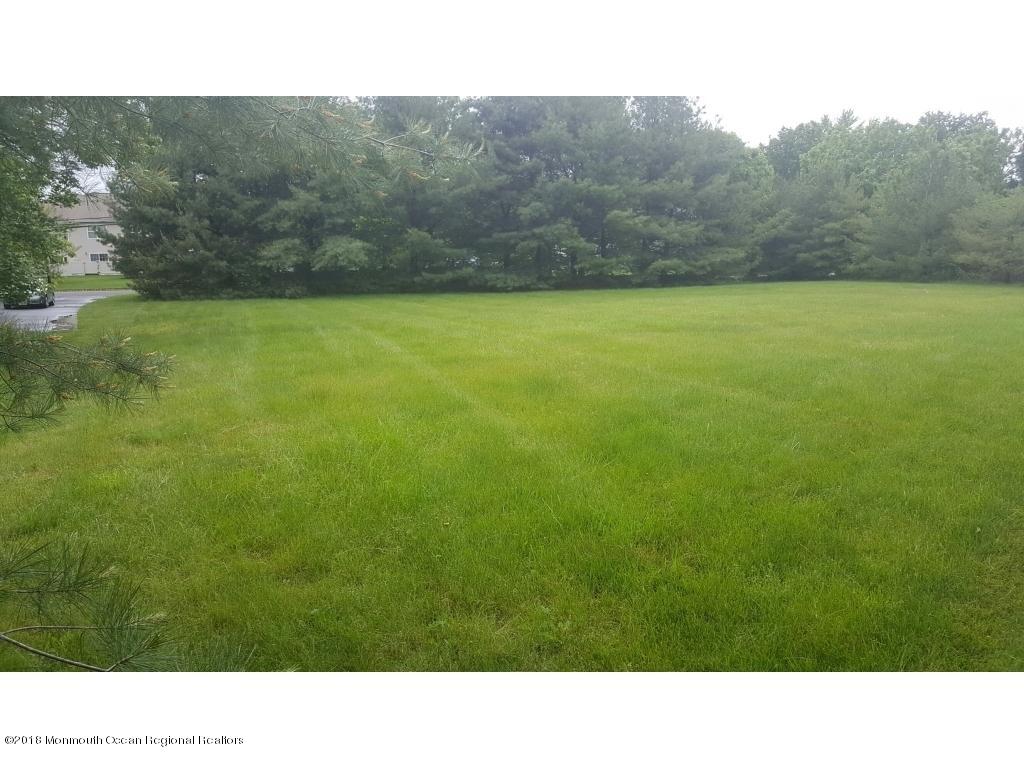 146 Howell Road Freehold, NJ 07728 - Photo 3 of 4 a open area with a yard