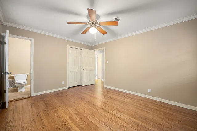 a view of a swimming pool with a yard