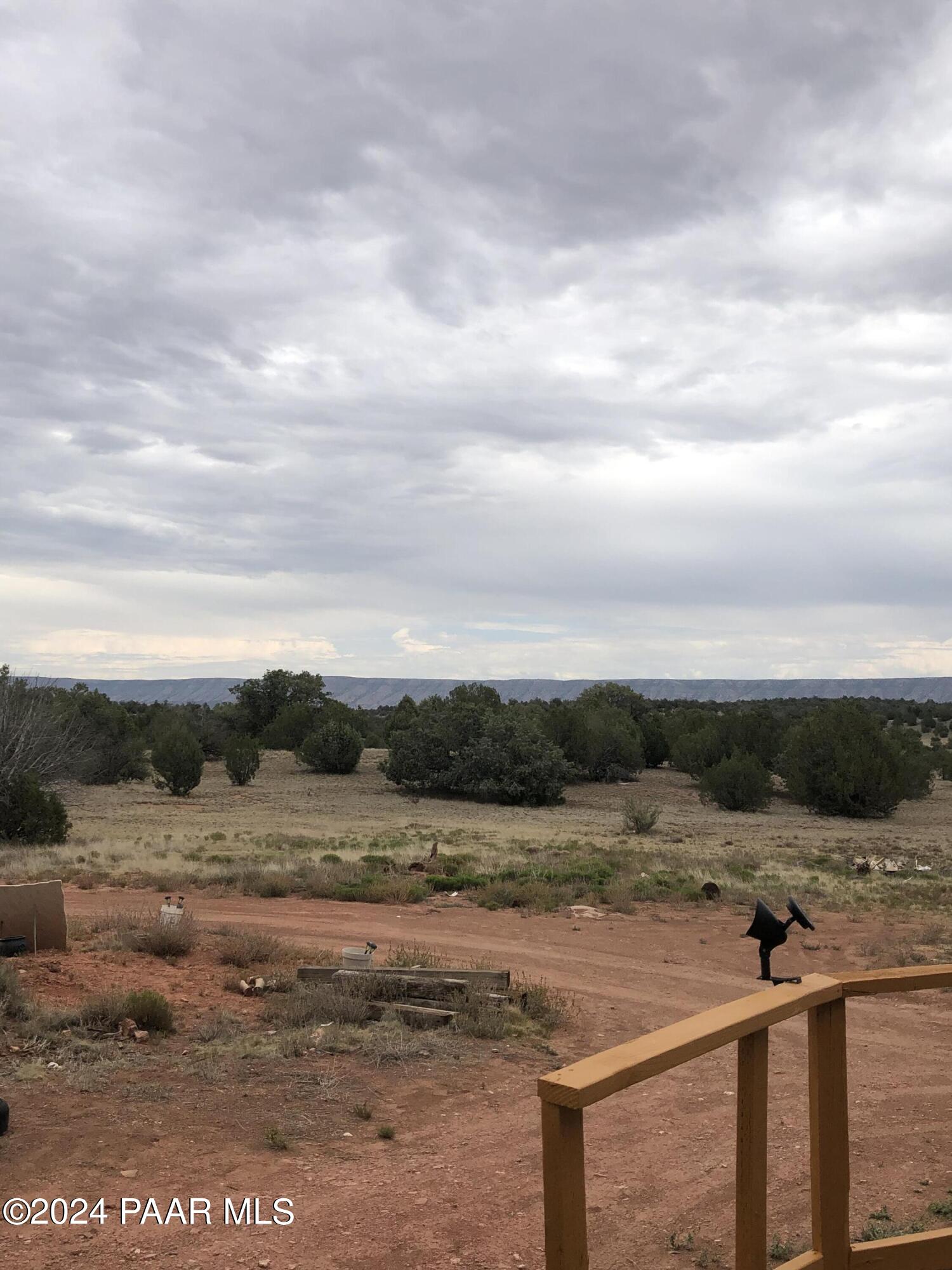 56539 El Parque Circle Seligman, AZ 86337 - Photo 18 of 37 a view of a lake with beach