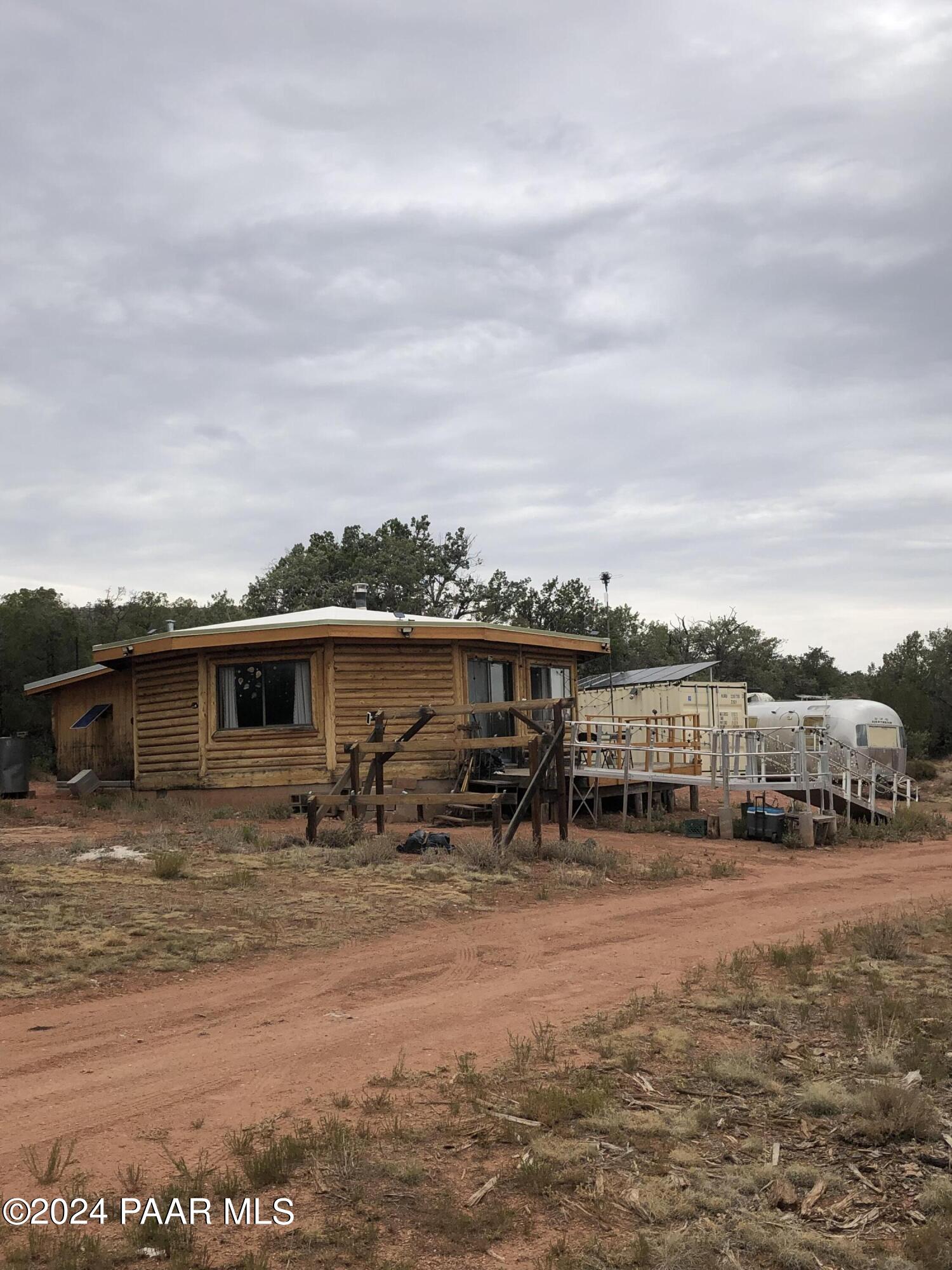 56539 El Parque Circle Seligman, AZ 86337 - Photo 23 of 37 a terrace with outdoor seating and city view