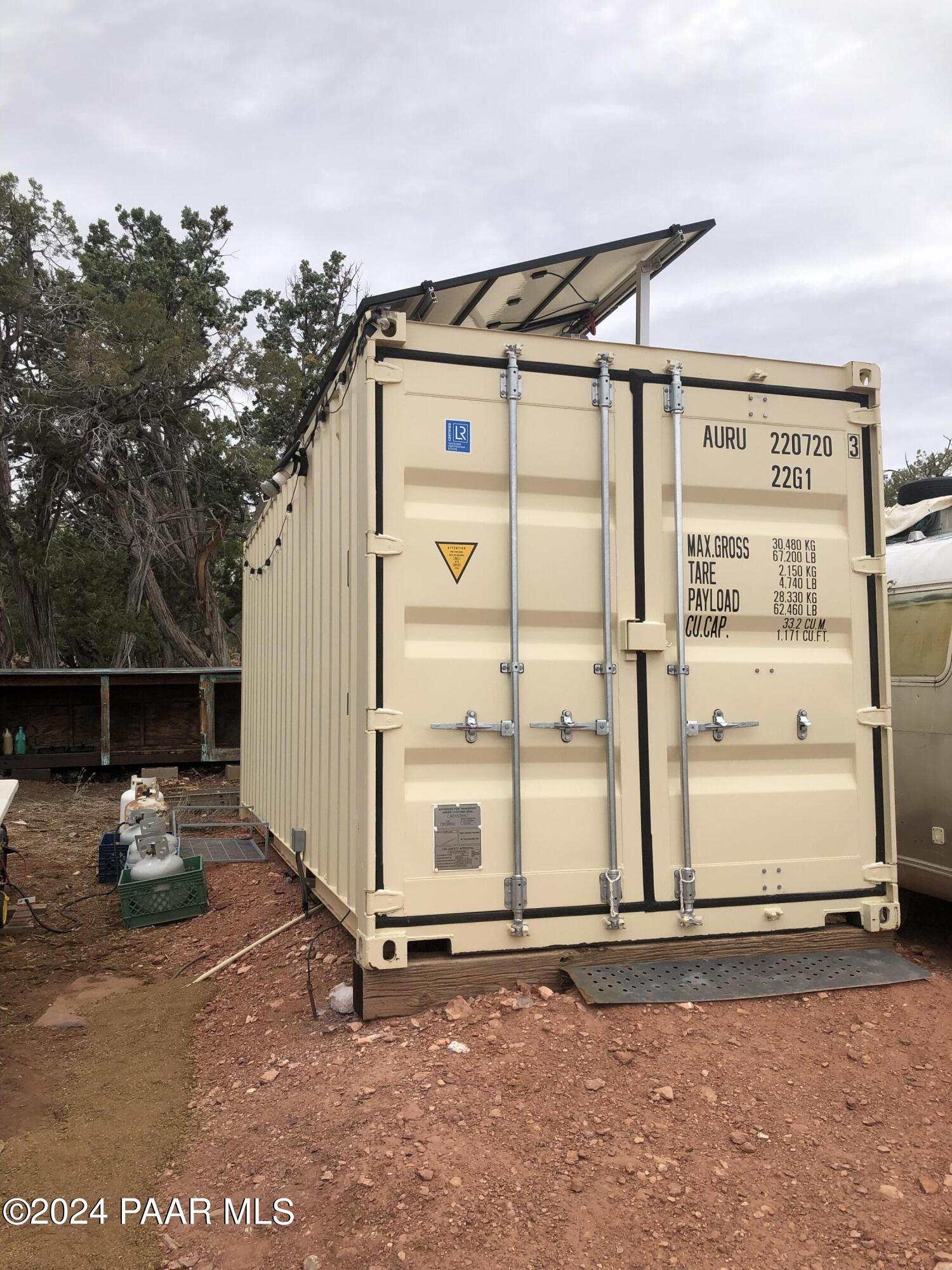 56539 El Parque Circle Seligman, AZ 86337 - Photo 27 of 37 a backyard of a house with table and chairs