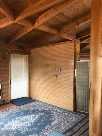 a view of room with stairs and a window