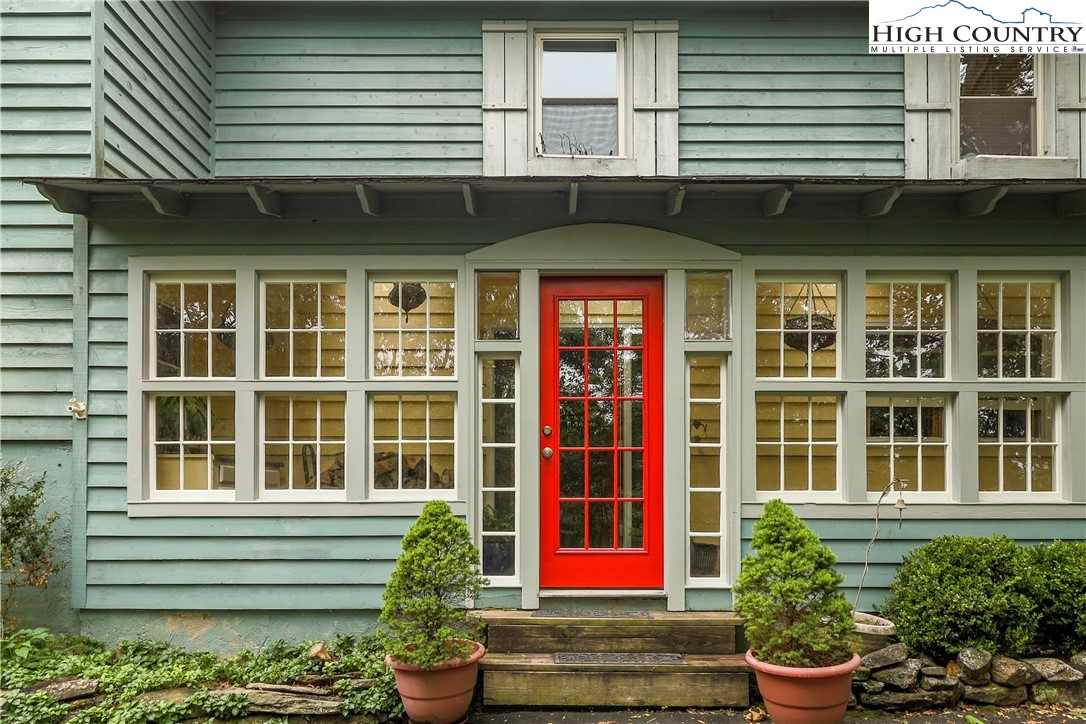 5033 Junaluska Road Boone, NC 28607 - Photo 2 of 34 a front view of a house with a yard