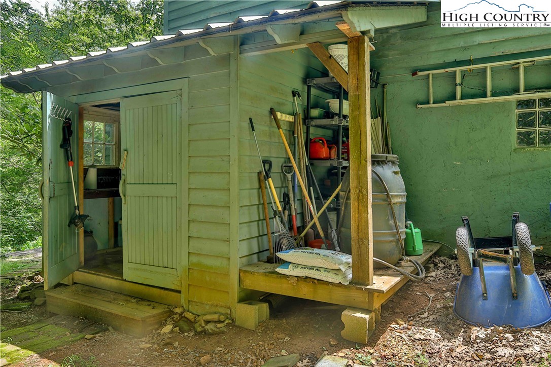 5033 Junaluska Road Boone, NC 28607 - Photo 28 of 34 a view of a house with a park