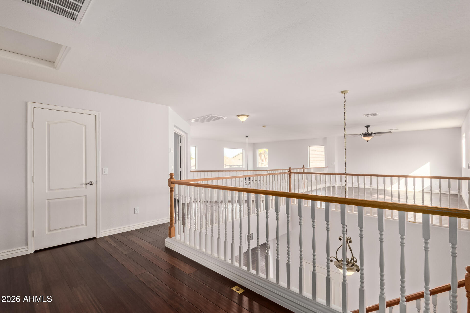 41106 West Coltin Way Maricopa, AZ 85138 - Photo 19 of 51 a view of hallway with wooden floor