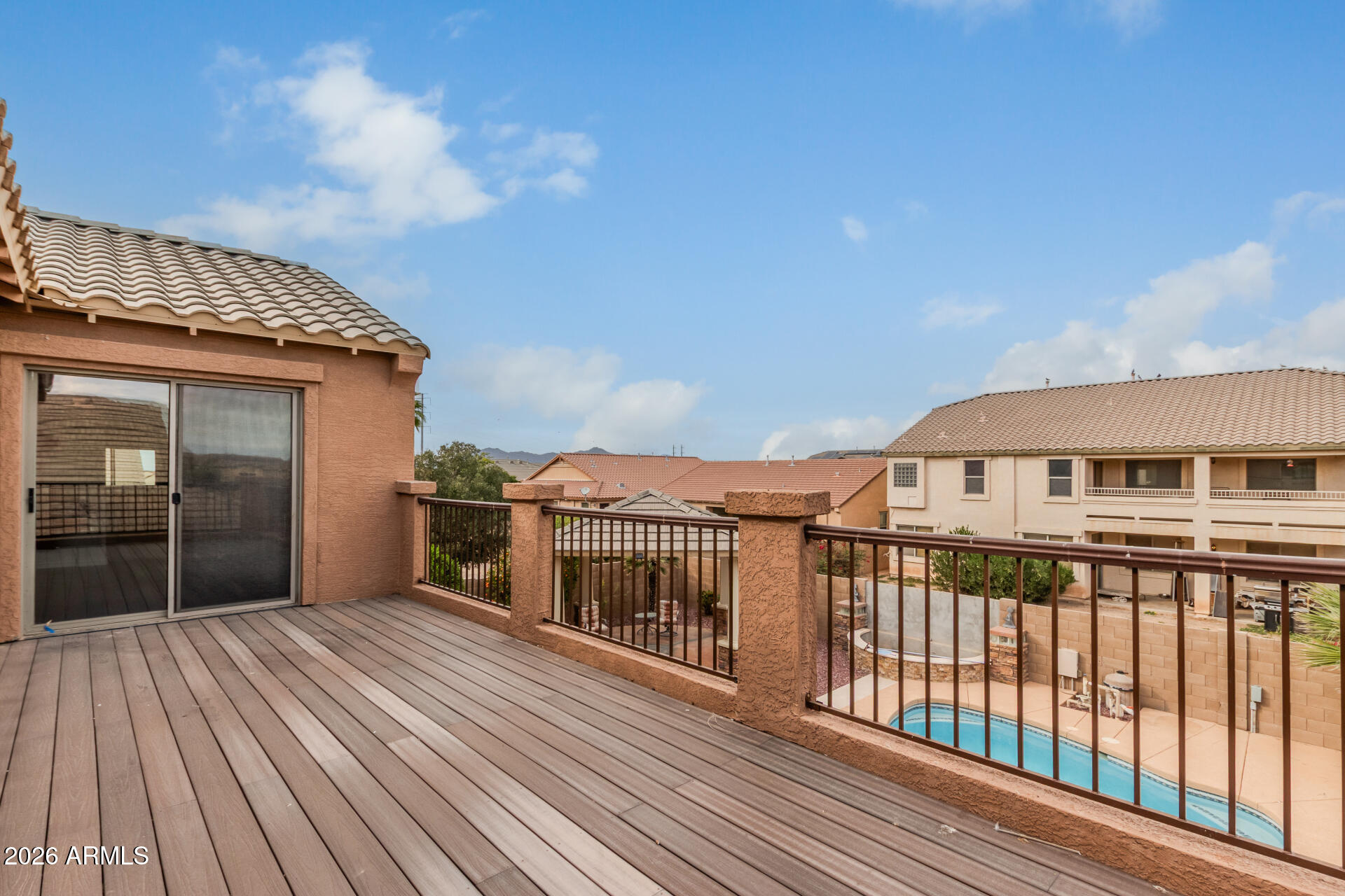 41106 West Coltin Way Maricopa, AZ 85138 - Photo 41 of 51 a view of a house with a roof deck