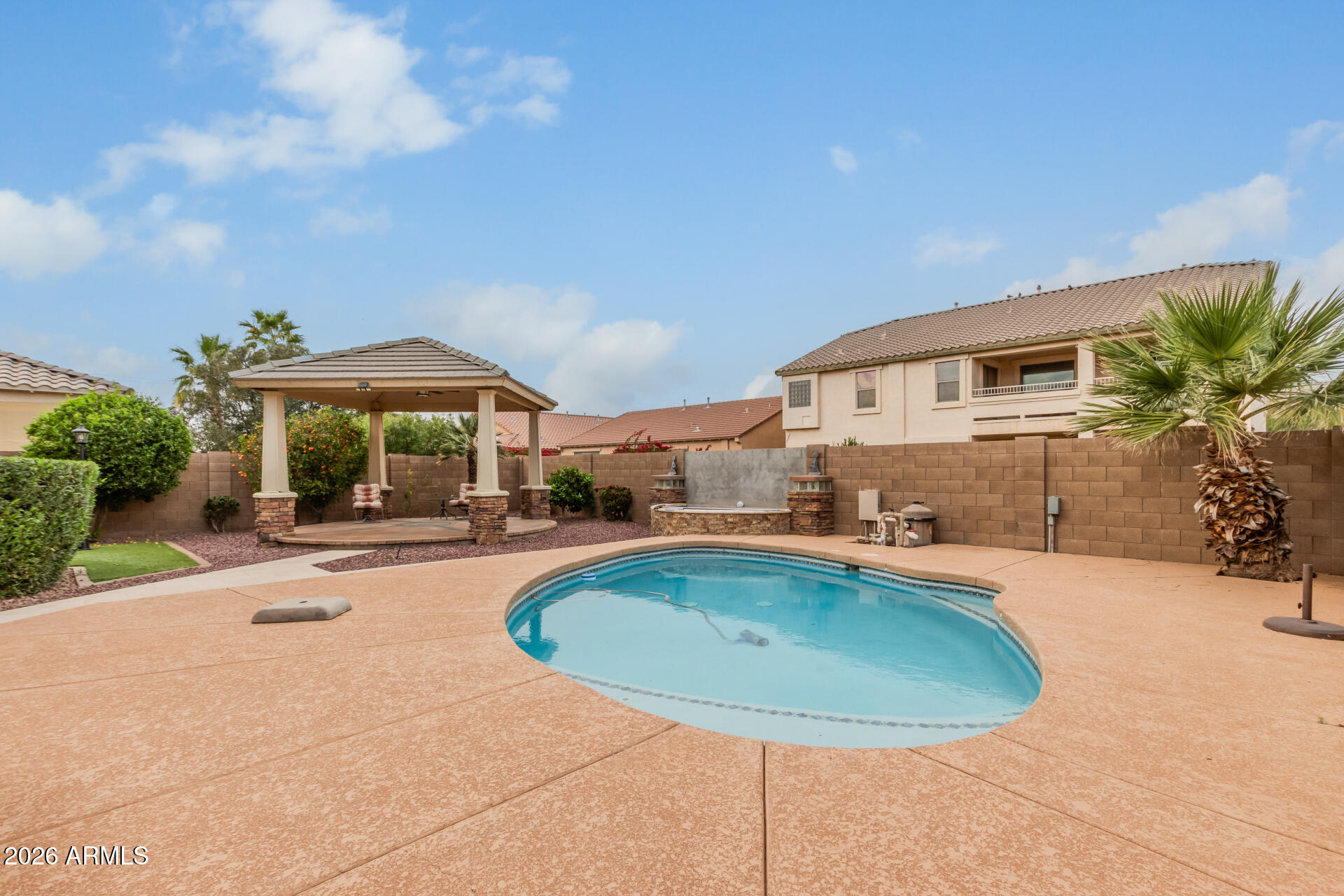 41106 West Coltin Way Maricopa, AZ 85138 - Photo 43 of 51 a swimming pool with outdoor seating yard and barbeque oven
