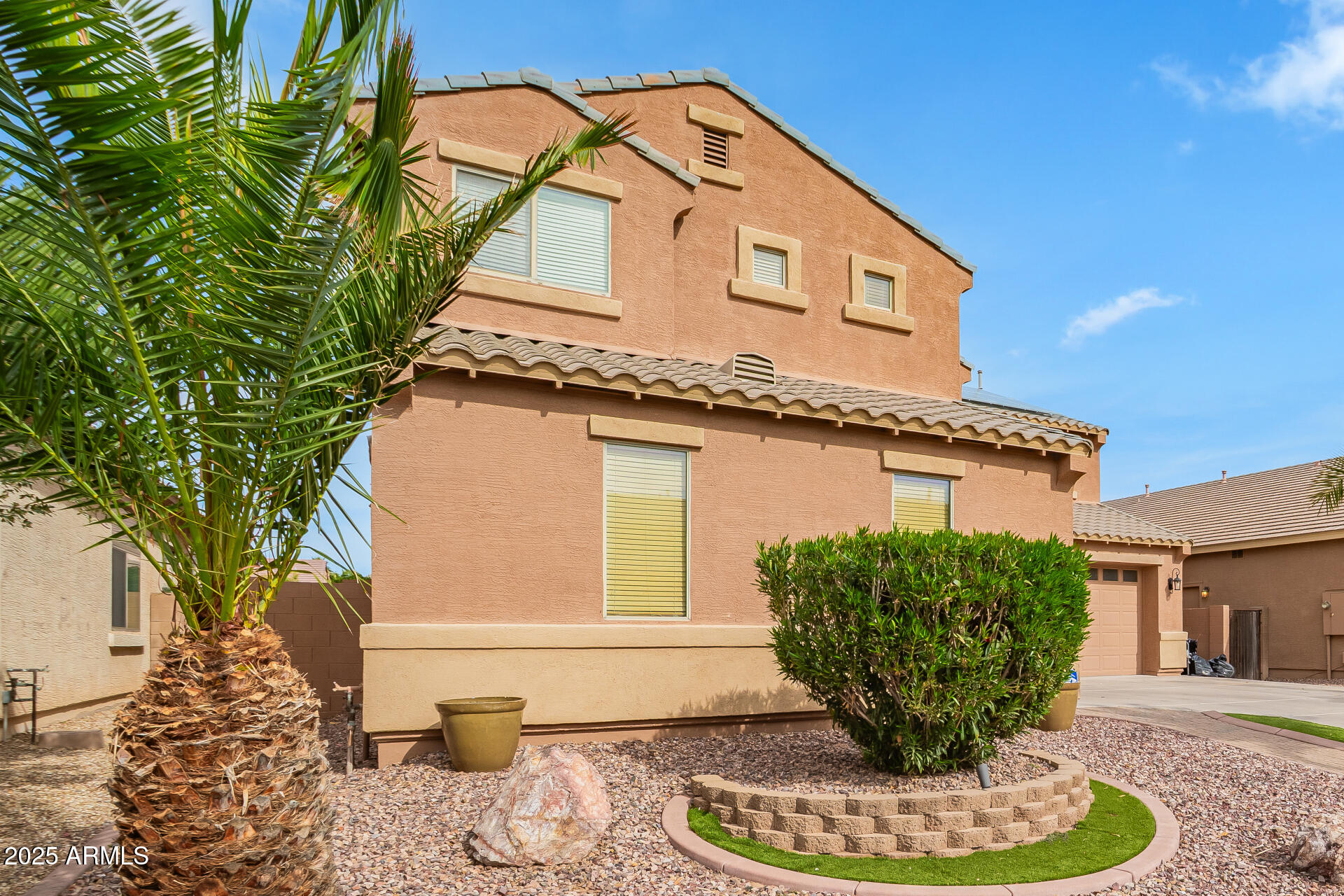 41106 West Coltin Way Maricopa, AZ 85138 - Photo 51 of 51 a front view of a house with a yard