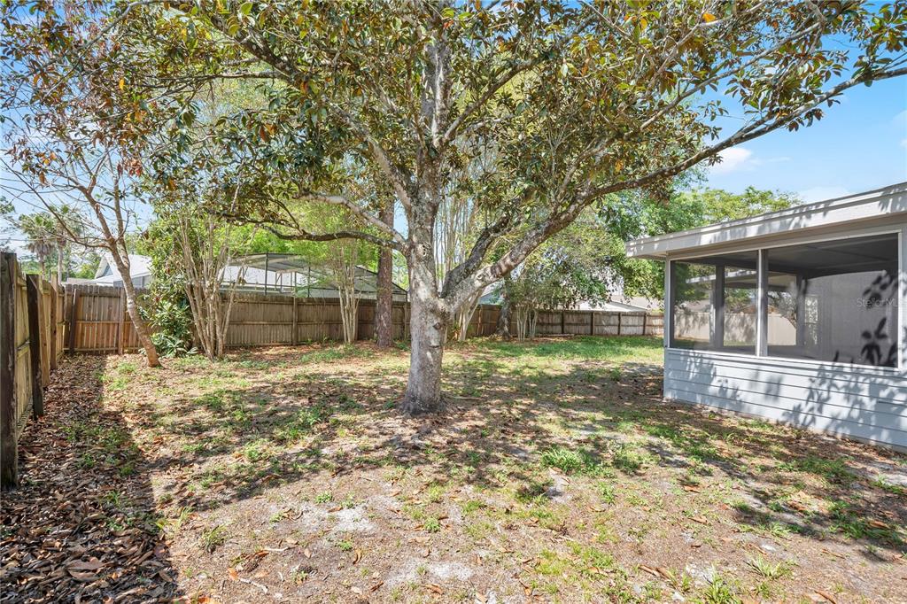 1050 Dishman Loop Oviedo, FL 32765 - Photo 22 of 32 a view of a house with a yard
