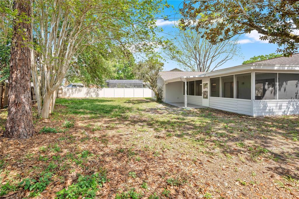 1050 Dishman Loop Oviedo, FL 32765 - Photo 23 of 32 a view of a house with a yard