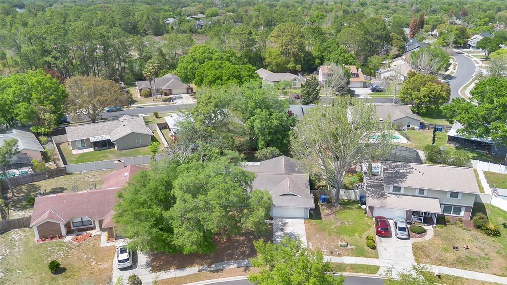 1050 Dishman Loop Oviedo, FL 32765 - Photo 27 of 32 an aerial view of residential houses with outdoor space