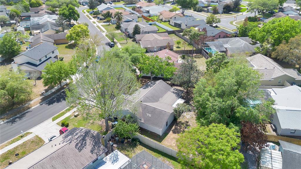 1050 Dishman Loop Oviedo, FL 32765 - Photo 29 of 32 an aerial view of a house with a yard