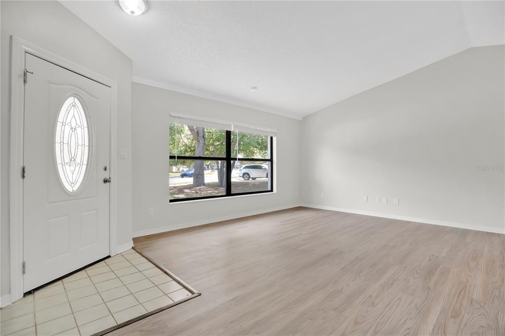1050 Dishman Loop Oviedo, FL 32765 - Photo 4 of 32 an empty room with windows