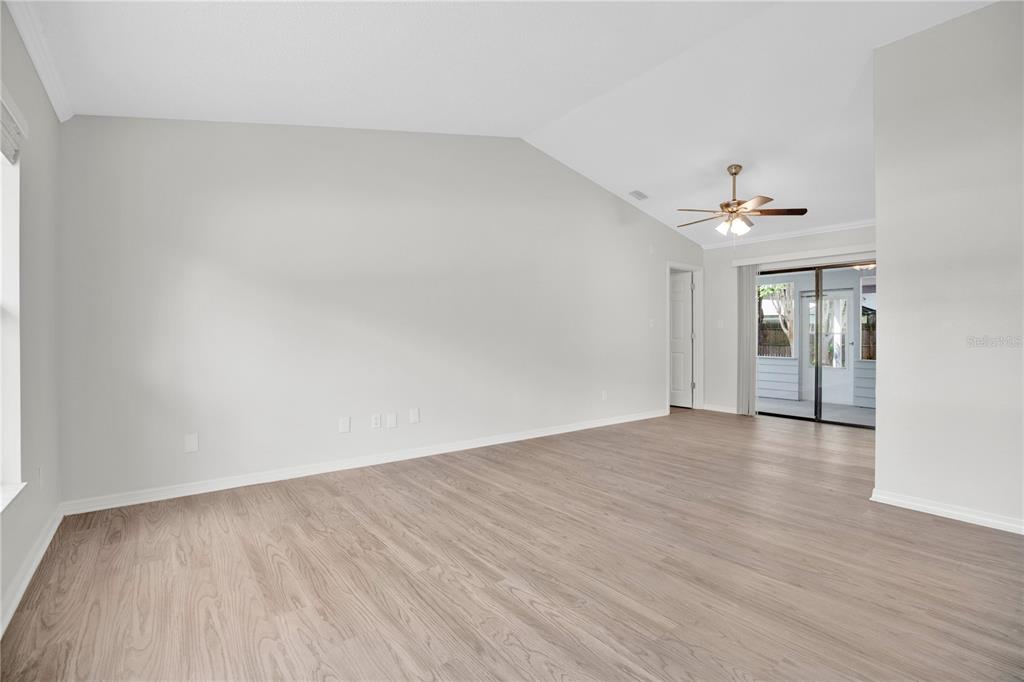 1050 Dishman Loop Oviedo, FL 32765 - Photo 6 of 32 wooden floor in an empty room
