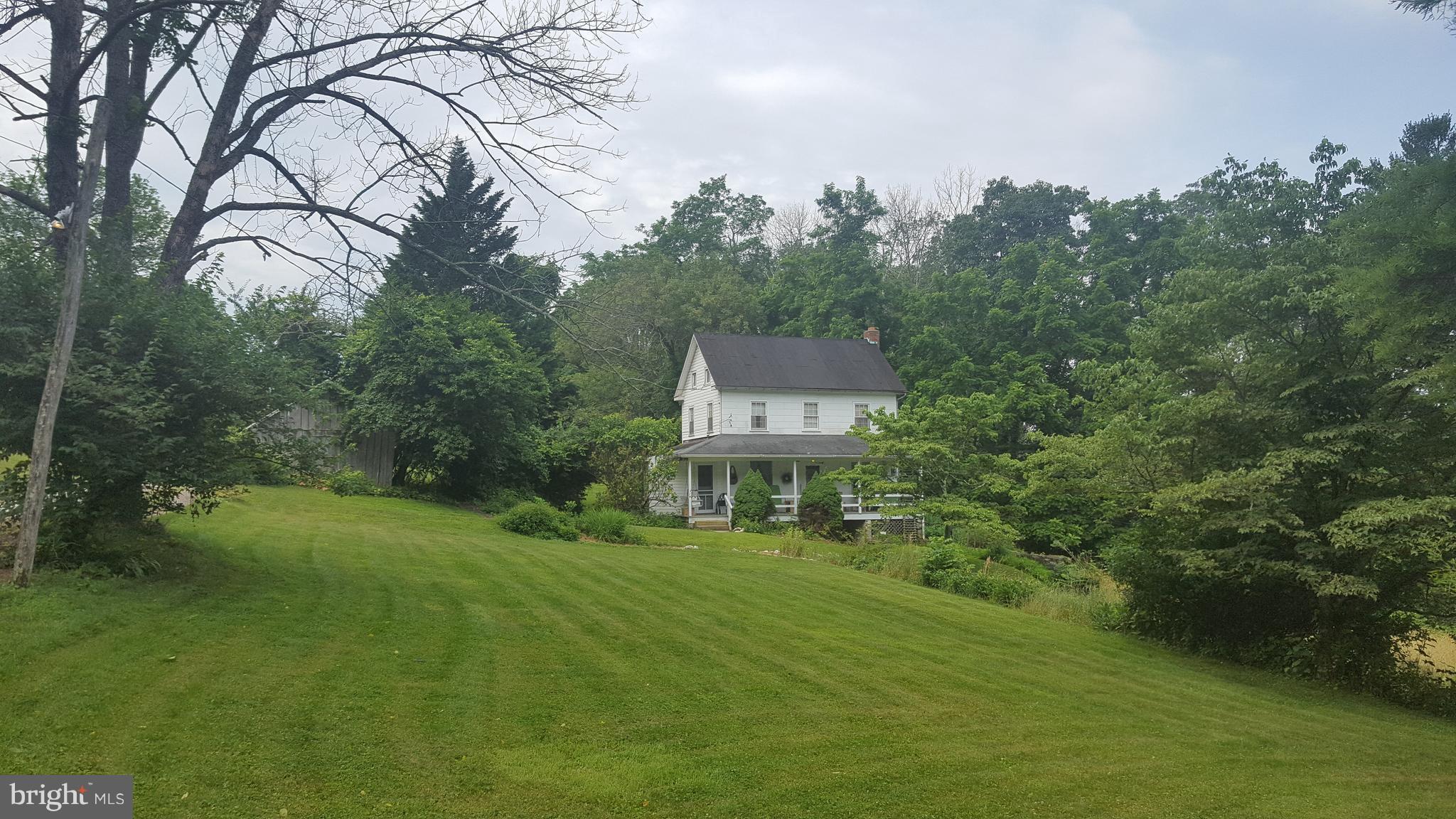 4349 Middlepoint Road Myersville, MD 21773 - Photo 1 of 27 a house view with a garden space