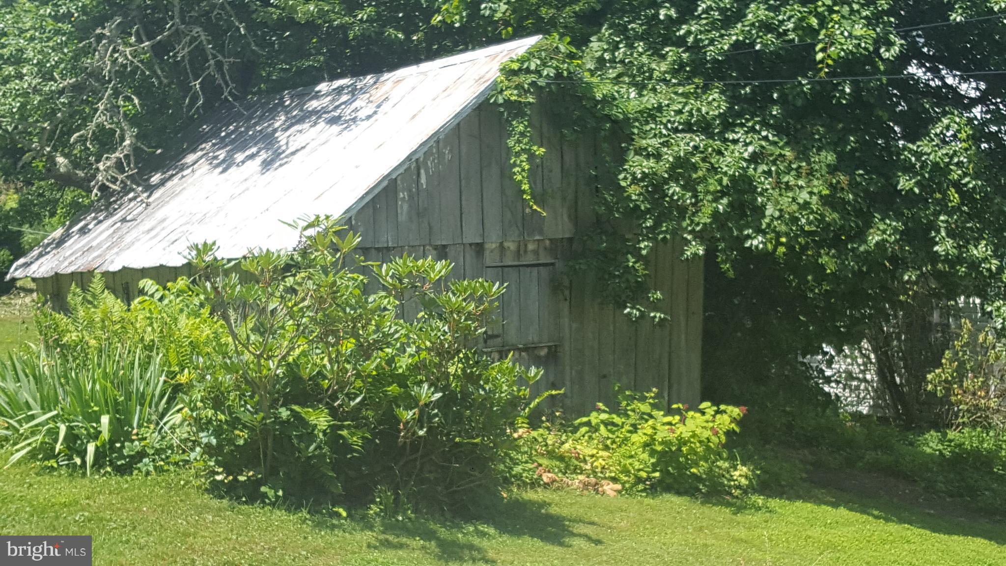 4349 Middlepoint Road Myersville, MD 21773 - Photo 24 of 27 a backyard of a house with lots of green space